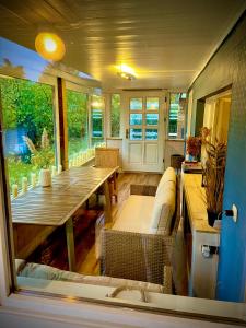 Posezení v ubytování Ferienhaus am Wald