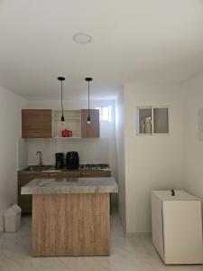 Η κουζίνα ή μικρή κουζίνα στο Apto N 302 vacacional +6 φωτογραφίες