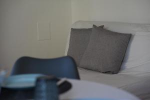 Ένα ή περισσότερα κρεβάτια σε δωμάτιο στο Collerisana Apartment +9 φωτογραφίες