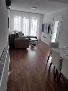 a living room with a couch and a table at Sarajevo Soul in Sarajevo