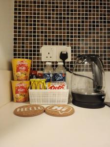 Kuchyň nebo kuchyňský kout v ubytování Deluxe Twin Room KK