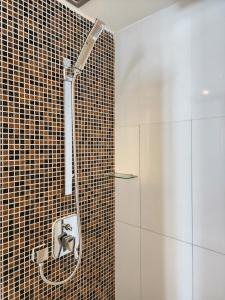 Koupelna v ubytování Deluxe Twin Room KK