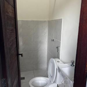 Koupelna v ubytování Residência j&m