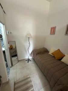 Ένα ή περισσότερα κρεβάτια σε δωμάτιο στο Alojamiento De Rocha