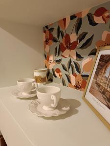 Příslušenství pro přípravu čaje a kávy v ubytování La parenthèse Brognonnaise