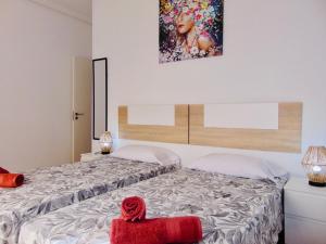 Una cama o camas en una habitación de Cuscio House Fuerteventura