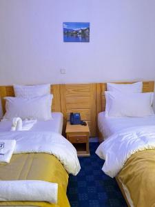 Postel nebo postele na pokoji v ubytování HOTEL LE BON CHOIX + 28 fotografií