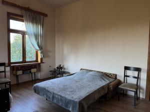 Postel nebo postele na pokoji v ubytování дом в лесу