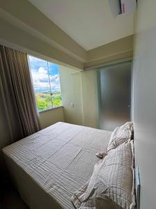 Postel nebo postele na pokoji v ubytování Apartamento Morais