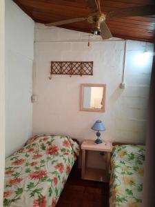 Ένα ή περισσότερα κρεβάτια σε δωμάτιο στο Cabañas rainbow