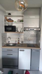 Kuchyň nebo kuchyňský kout v ubytování Studio Hyper centre - Ski