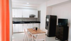 Η κουζίνα ή μικρή κουζίνα στο Beach Lounge Suites Punta Cana 1