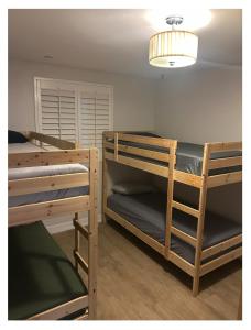 Postel nebo postele na pokoji v ubytování Normandie Good Vibes Only