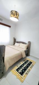 Ένα ή περισσότερα κρεβάτια σε δωμάτιο στο mount heaven get away