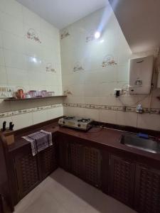 Η κουζίνα ή μικρή κουζίνα στο Matru Pitru Chaya Homestay +30 φωτογραφίες