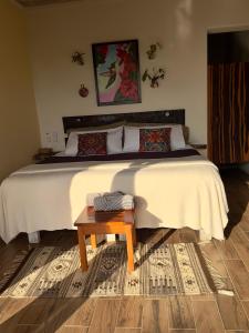 Postel nebo postele na pokoji v ubytování Casa Jasmin Bed & Breakfast