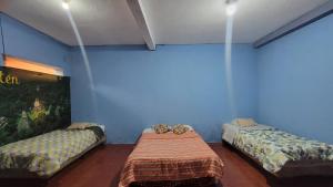 Ένα ή περισσότερα κρεβάτια σε δωμάτιο στο Maya'n House +1 φωτογραφίες