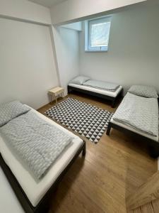 Ένα ή περισσότερα κρεβάτια σε δωμάτιο στο Pohoda 1 +5 φωτογραφίες