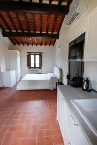 Ένα ή περισσότερα κρεβάτια σε δωμάτιο στο Agriturismo GIOLE