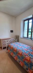 En eller flere senge i et værelse på la buca delL'IStrice + 19 billeder