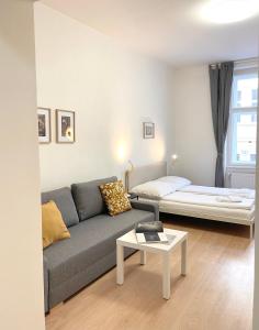 Postel nebo postele na pokoji v ubytování Cozy Atmos Apartments