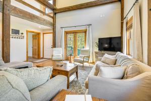 a living room with two couches and a tv at Fish, Hike and Ski Spacious Family Escape in Eden in Eden