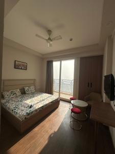 Ένα ή περισσότερα κρεβάτια σε δωμάτιο στο Paradise stay