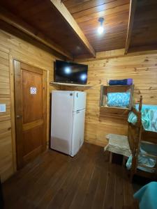 Μια τηλεόραση ή/και κέντρο ψυχαγωγίας στο Cabaña "mainimbu"