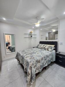 Postel nebo postele na pokoji v ubytování Aconchego de Apartamento Conforto de hotel, localização TOP + 13 fotografií