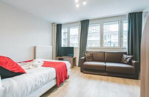 Ένα ή περισσότερα κρεβάτια σε δωμάτιο στο Le Faidherbe Hotel Coeur de ville +54 φωτογραφίες