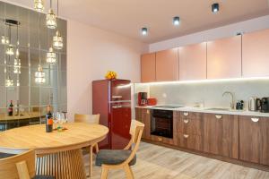 Η κουζίνα ή μικρή κουζίνα στο Jantar Porta Mare apartament