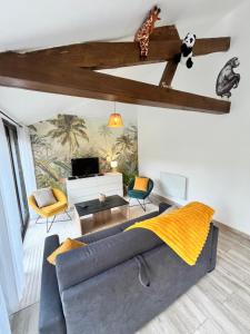 Posezení v ubytování Au petit Jardin Sézannais