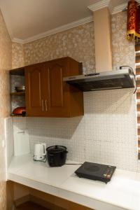 Η κουζίνα ή μικρή κουζίνα στο The Pilgrims' Place