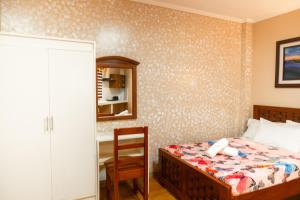 Ένα ή περισσότερα κρεβάτια σε δωμάτιο στο The Pilgrims' Place +1 φωτογραφίες