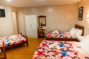 Ένα ή περισσότερα κρεβάτια σε δωμάτιο στο The Pilgrims' Place