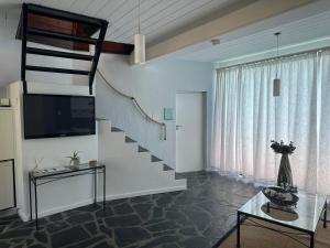 TV a/nebo společenská místnost v ubytování Southern Cross Guesthouse