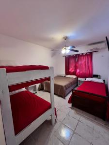 Ένα ή περισσότερα κρεβάτια σε δωμάτιο στο Aguas de marzo