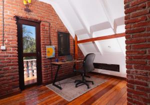 TV a/nebo společenská místnost v ubytování Brickhaus Hotel - Mbezi Beach