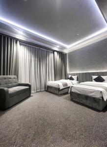 Postel nebo postele na pokoji v ubytování Transit Hotel