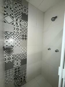 Ένα μπάνιο στο Habitación privada en residencia familiar