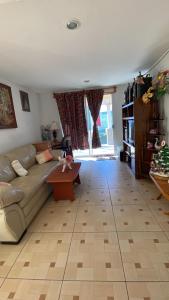 Χώρος καθιστικού στο Habitación privada en residencia familiar