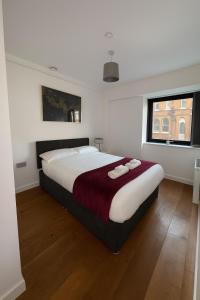 Voodi või voodid majutusasutuse Modern 2Bed Flat, Close to Gatwick&Central London toas