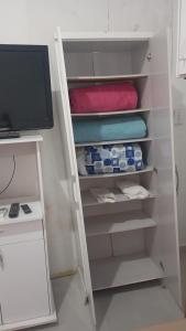 Et tv og/eller underholdning på Suíte quase frente à rodoviária