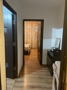 Postel nebo postele na pokoji v ubytování Apartament Calea București + 7 fotografií