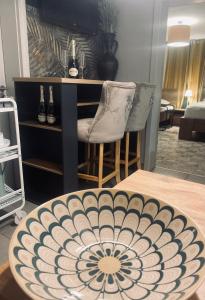 a room with a table and a chair and a plate at Rooms & Apartment ZALA Near Airport & Cable car in Cerklje na Gorenjskem