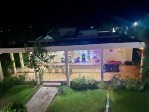 a view of a house at night at Agafay Olivium 