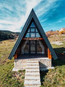 a tiny house on top of a hill at Čarobna jutra Zlatara 2 in Radijevići