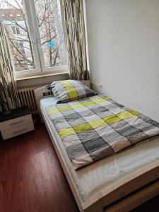 Postel nebo postele na pokoji v ubytování 2-Zimmer Apartment Sofia, gemütlich wie zu Hause