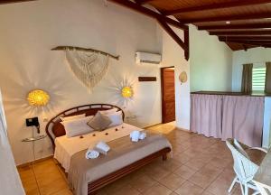 Postel nebo postele na pokoji v ubytování Residence AU 'TI SUCRIER + 110 fotografií