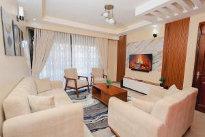 Χώρος καθιστικού στο Welcome to Kaniz Furnished Apartment